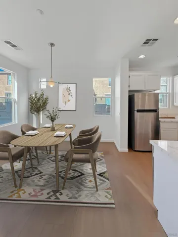 a view of a dining room with furniture