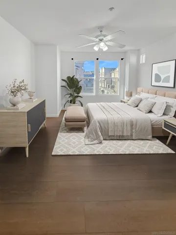 a living room with furniture chandelier and view of kitchen