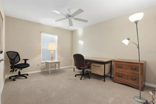 a front view of a building with parking space