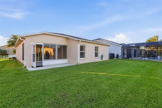 a view of a car park in front of house