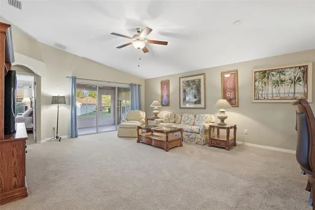 a bathroom with a double vanity sink mirror and shower