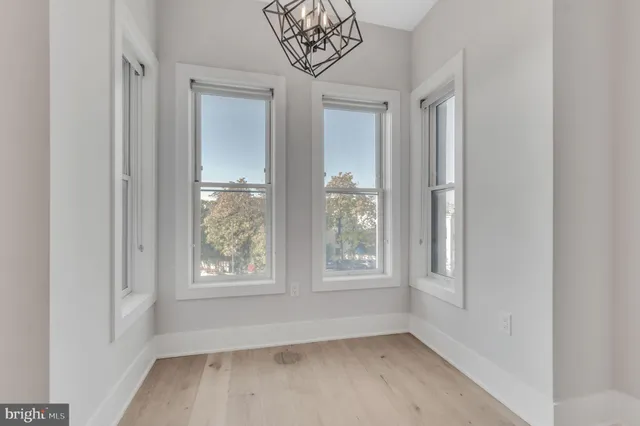 an empty room that has a window