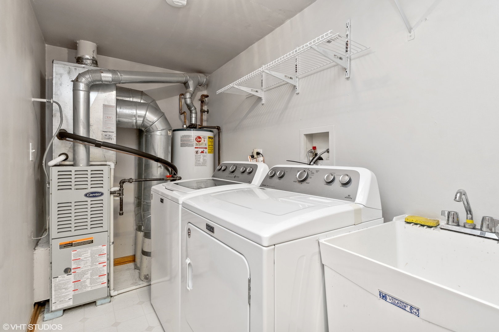 6850 Ridge Point Drive, Unit 1A Oak Forest, IL 60452 - Photo 17 of 20 a utility room with dryer and washer