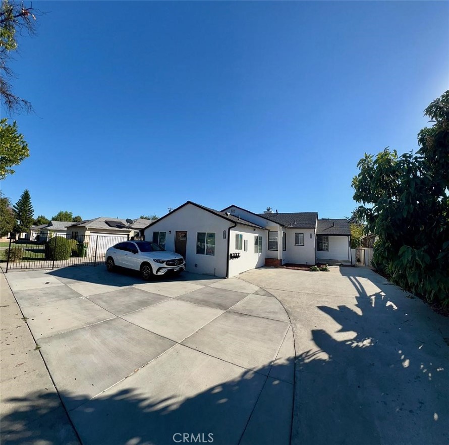 18654 1/2 Runnymede Street Reseda, CA 91335 - Photo 12 of 12 a view of a house with a yard