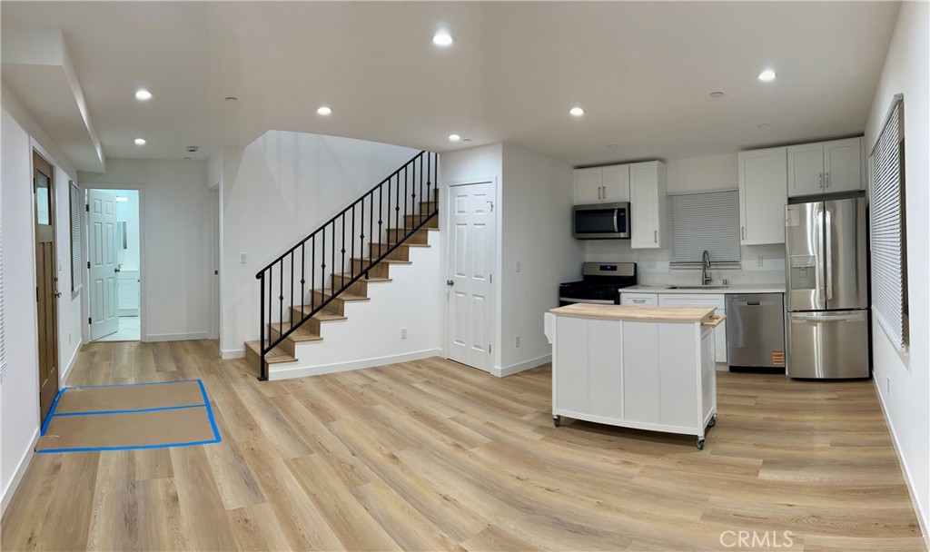 18654 1/2 Runnymede Street Reseda, CA 91335 - Photo 2 of 12 a view of kitchen with cabinets and stainless steel appliances
