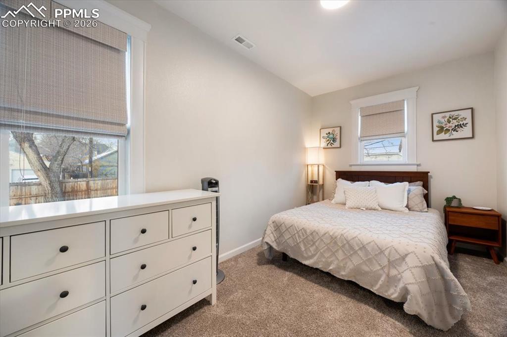 421 South Prospect Street Colorado Springs, CO 80903 - Photo 11 of 48 a bedroom with a bed and a window