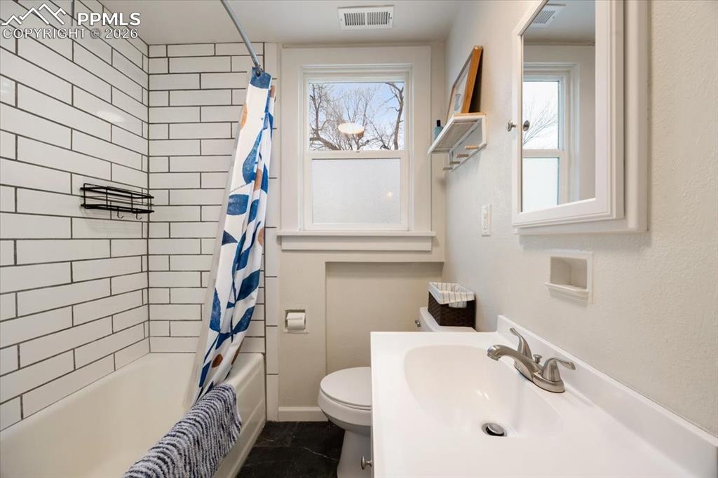 421 South Prospect Street Colorado Springs, CO 80903 - Photo 14 of 48 a bathroom with a sink toilet and shower