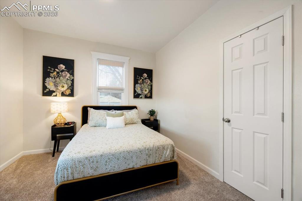 421 South Prospect Street Colorado Springs, CO 80903 - Photo 15 of 48 a bedroom with a bed and a window