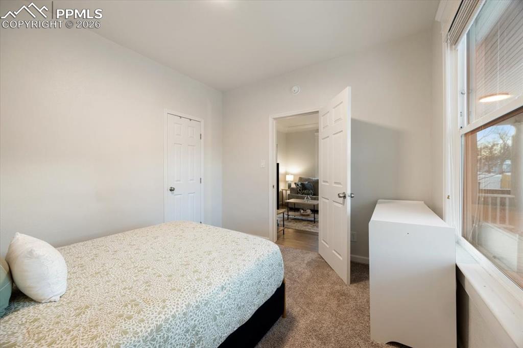 421 South Prospect Street Colorado Springs, CO 80903 - Photo 17 of 48 a bedroom with a bed and a view of bathroom