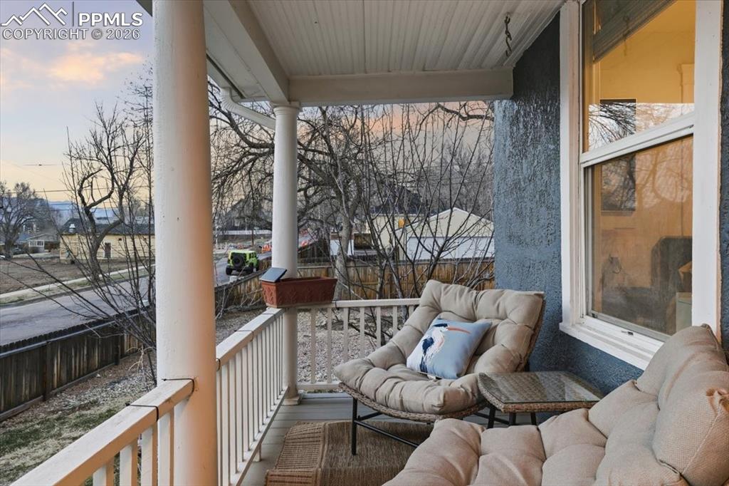 421 South Prospect Street Colorado Springs, CO 80903 - Photo 3 of 48 a balcony with furniture and a potted plant