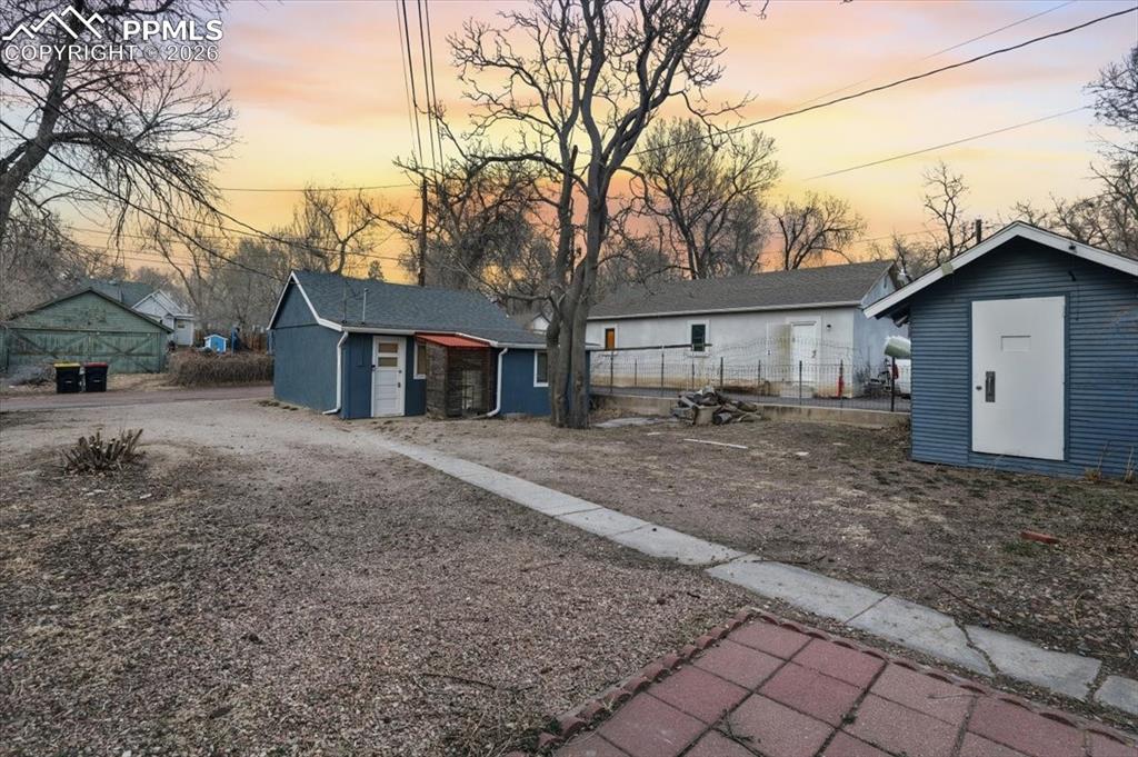 421 South Prospect Street Colorado Springs, CO 80903 - Photo 43 of 48 a front view of a house with a yard and garage