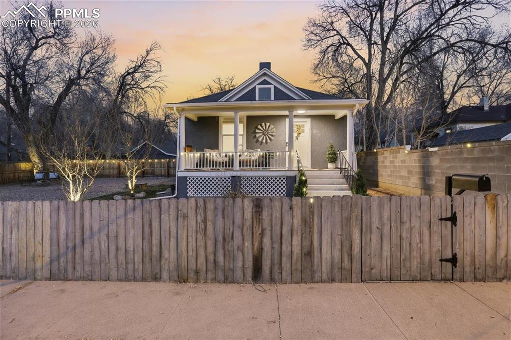 421 South Prospect Street Colorado Springs, CO 80903 - Photo 48 of 48 a front view of house with wooden fence