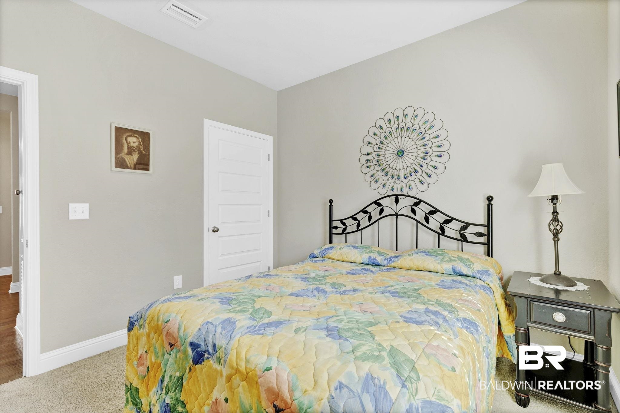 1547 Kairos Loop Foley, AL 36535 - Photo 31 of 55 Bedroom with carpet, visible vents, and baseboards