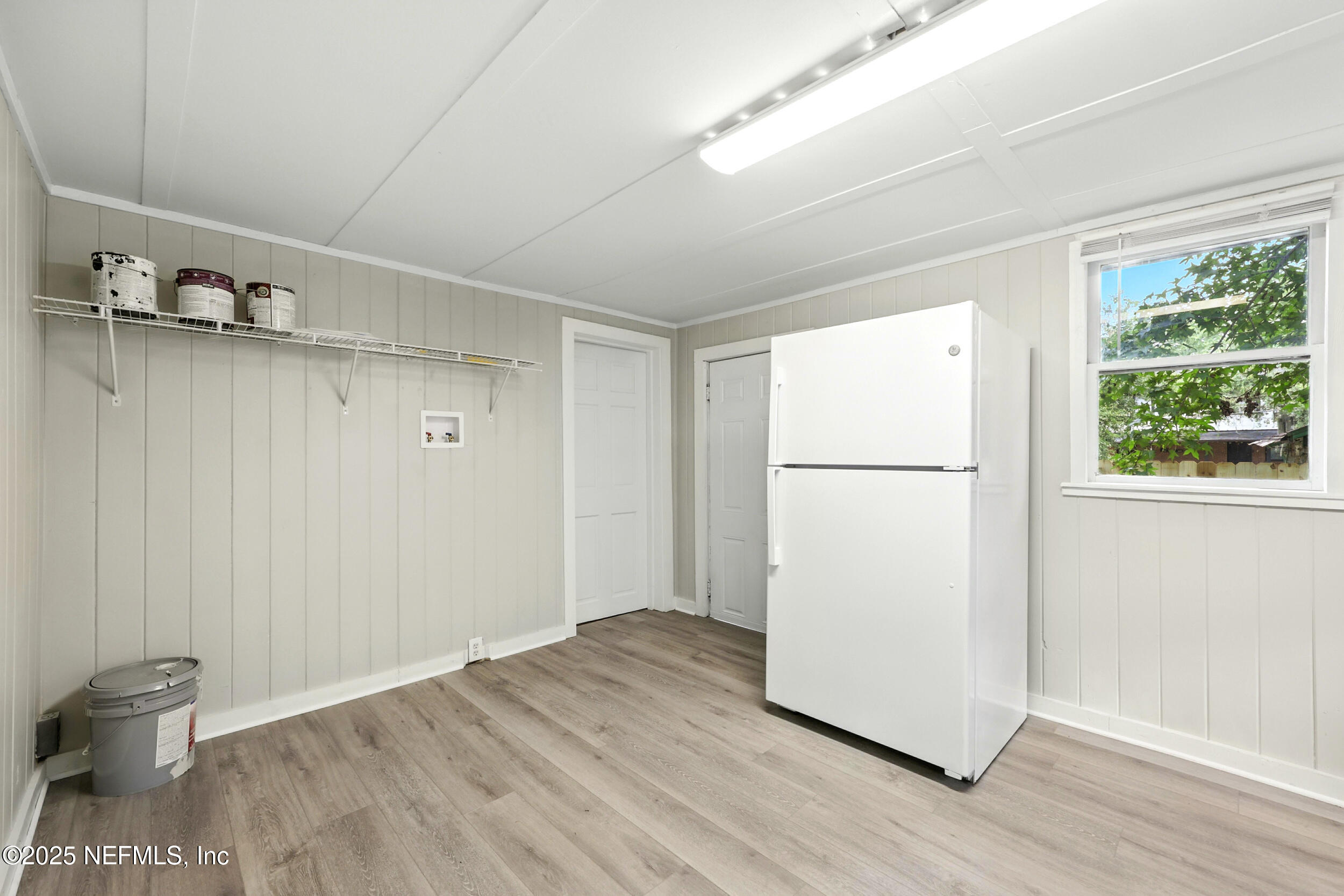 2858 Downing Street Jacksonville, FL 32205 - Photo 12 of 29 a view of a room with wooden floor and a window
