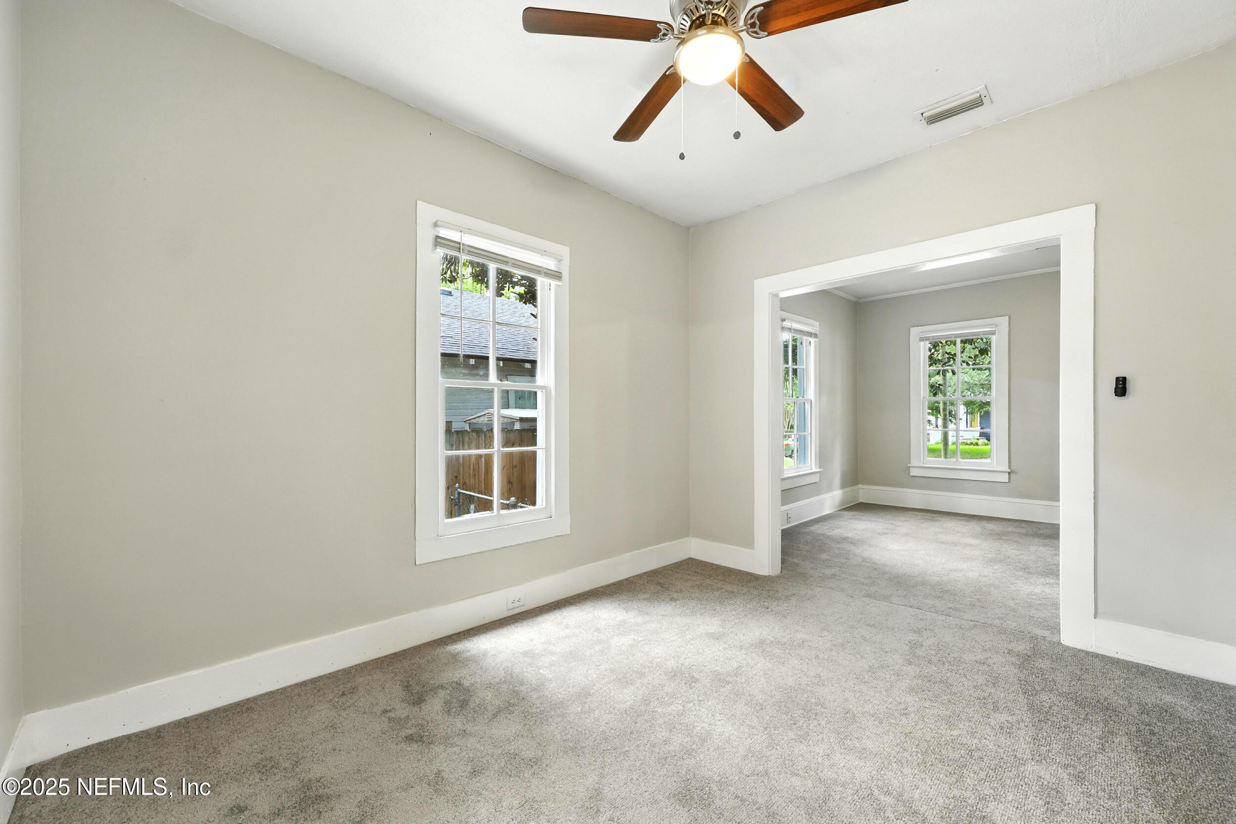 2858 Downing Street Jacksonville, FL 32205 - Photo 13 of 29 an empty room with windows and closet