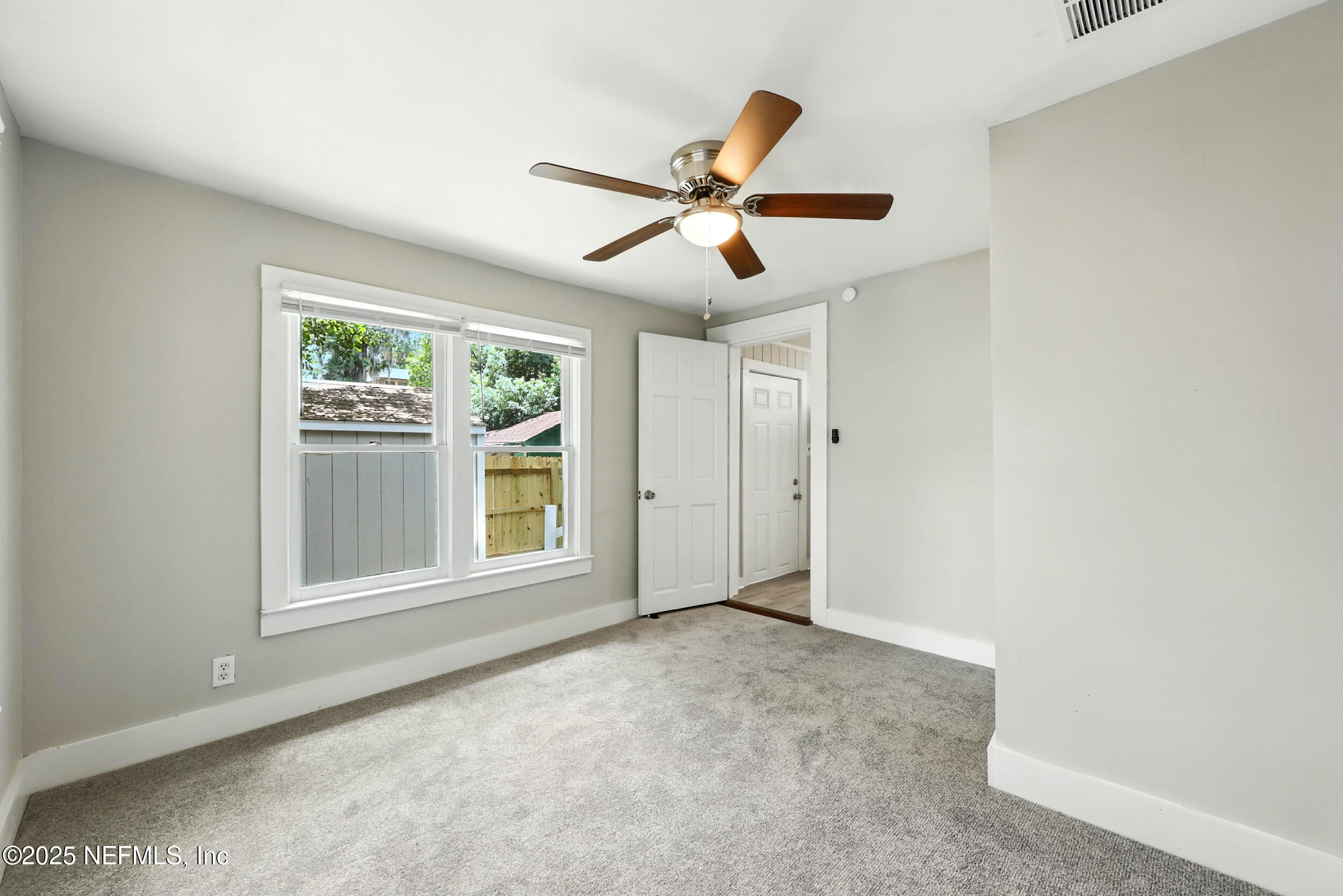 2858 Downing Street Jacksonville, FL 32205 - Photo 22 of 29 a view of empty room with windows