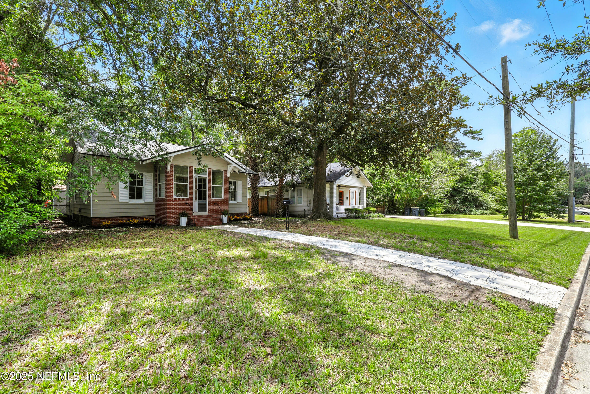 2858 Downing Street Jacksonville, FL 32205 - Photo 29 of 29 a front view of a house with a yard