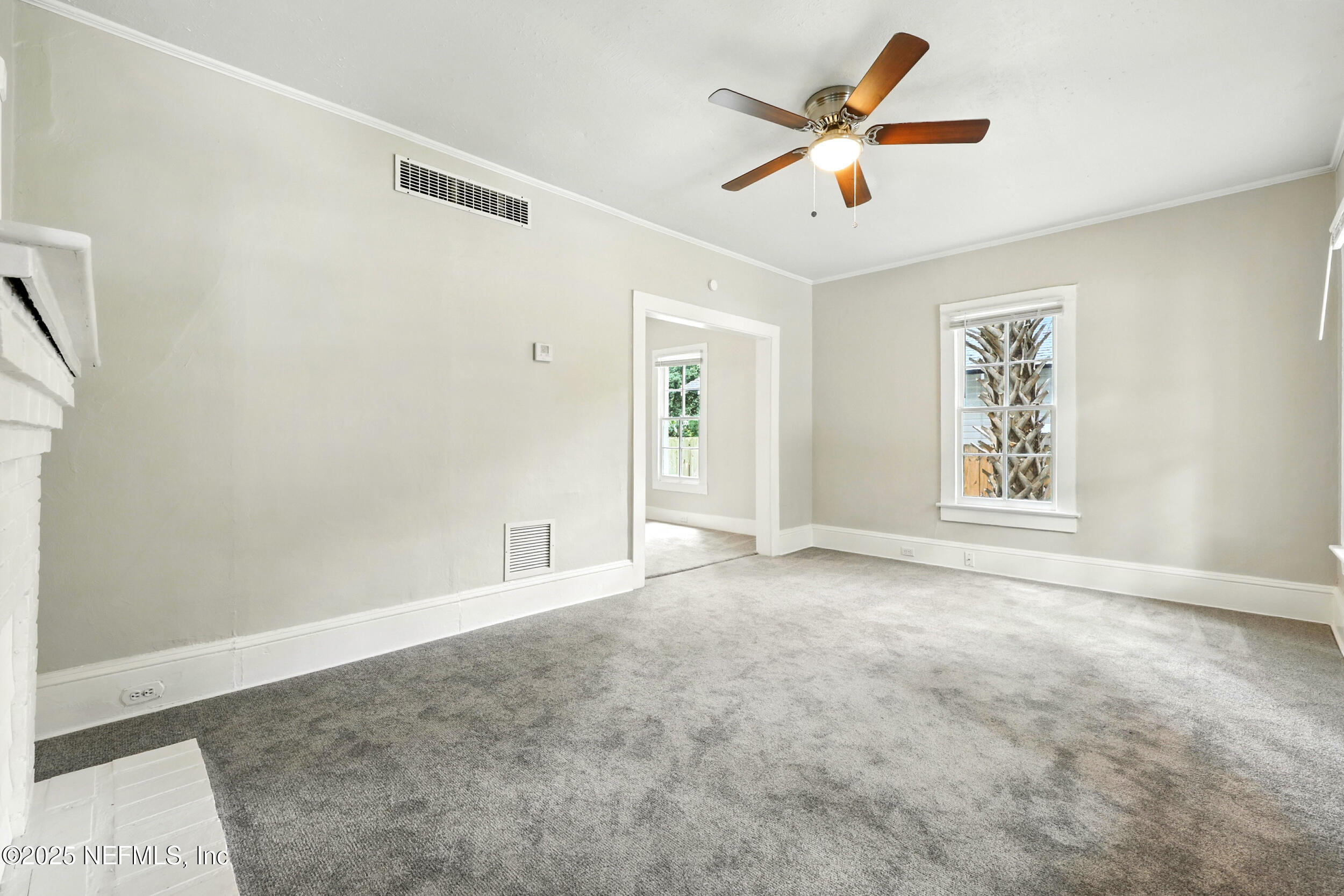 2858 Downing Street Jacksonville, FL 32205 - Photo 3 of 29 a view of an empty room with a window