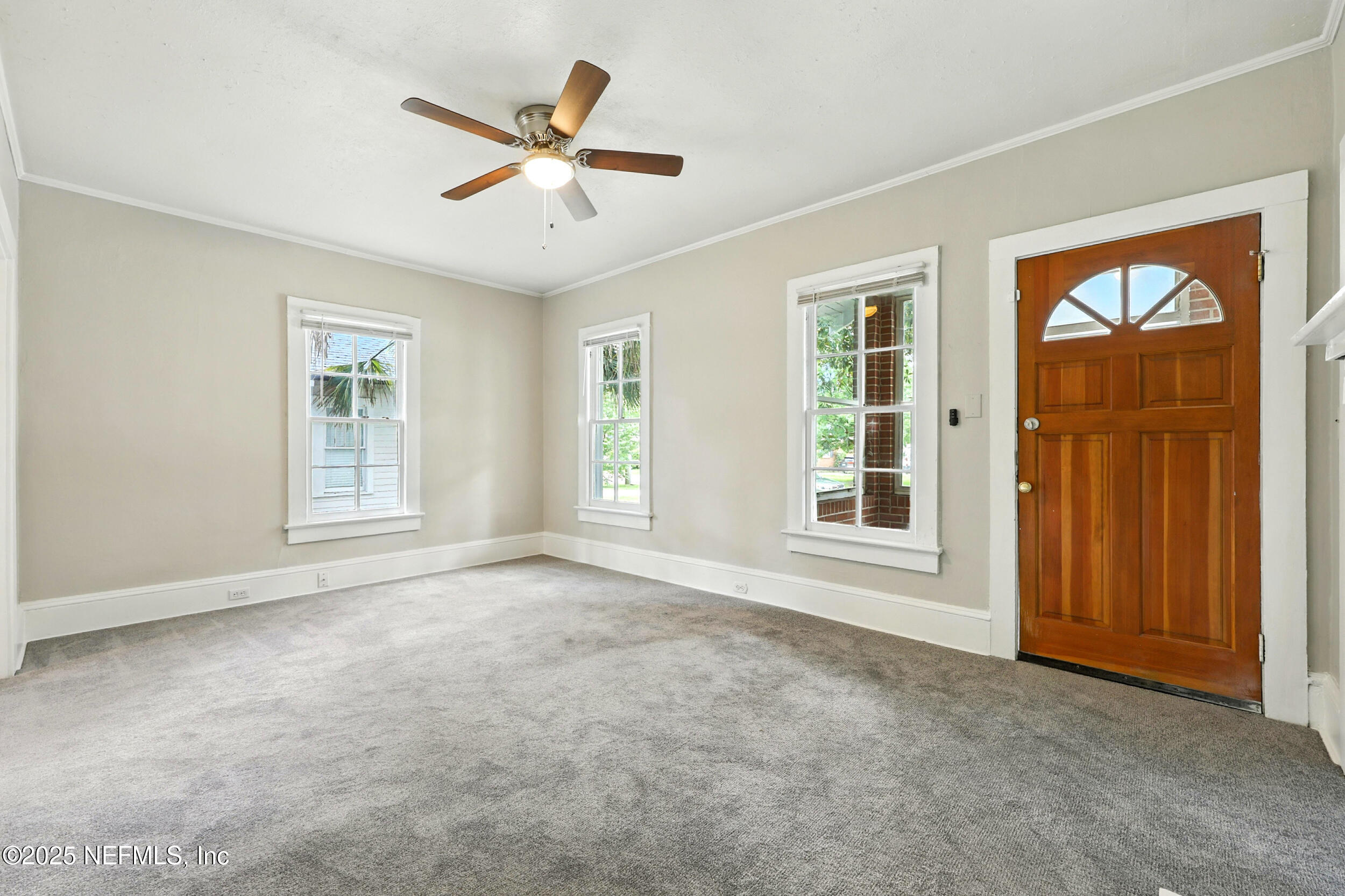 2858 Downing Street Jacksonville, FL 32205 - Photo 4 of 29 a view of an empty room with a window