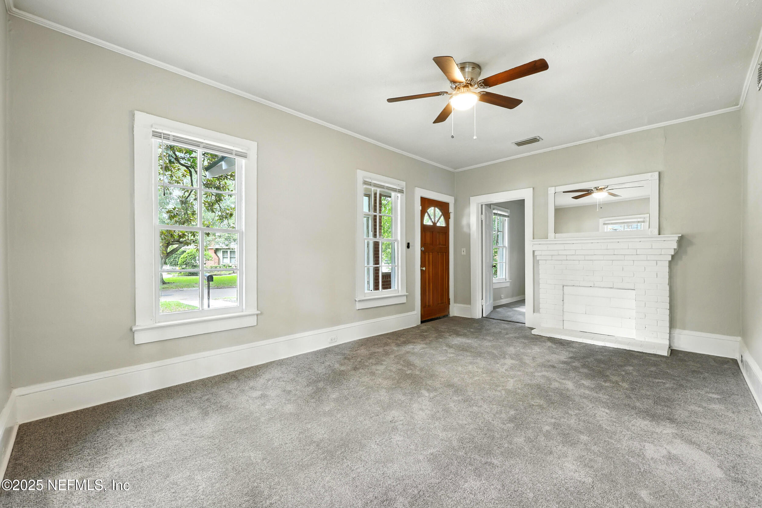 2858 Downing Street Jacksonville, FL 32205 - Photo 5 of 29 a view of an empty room with a window