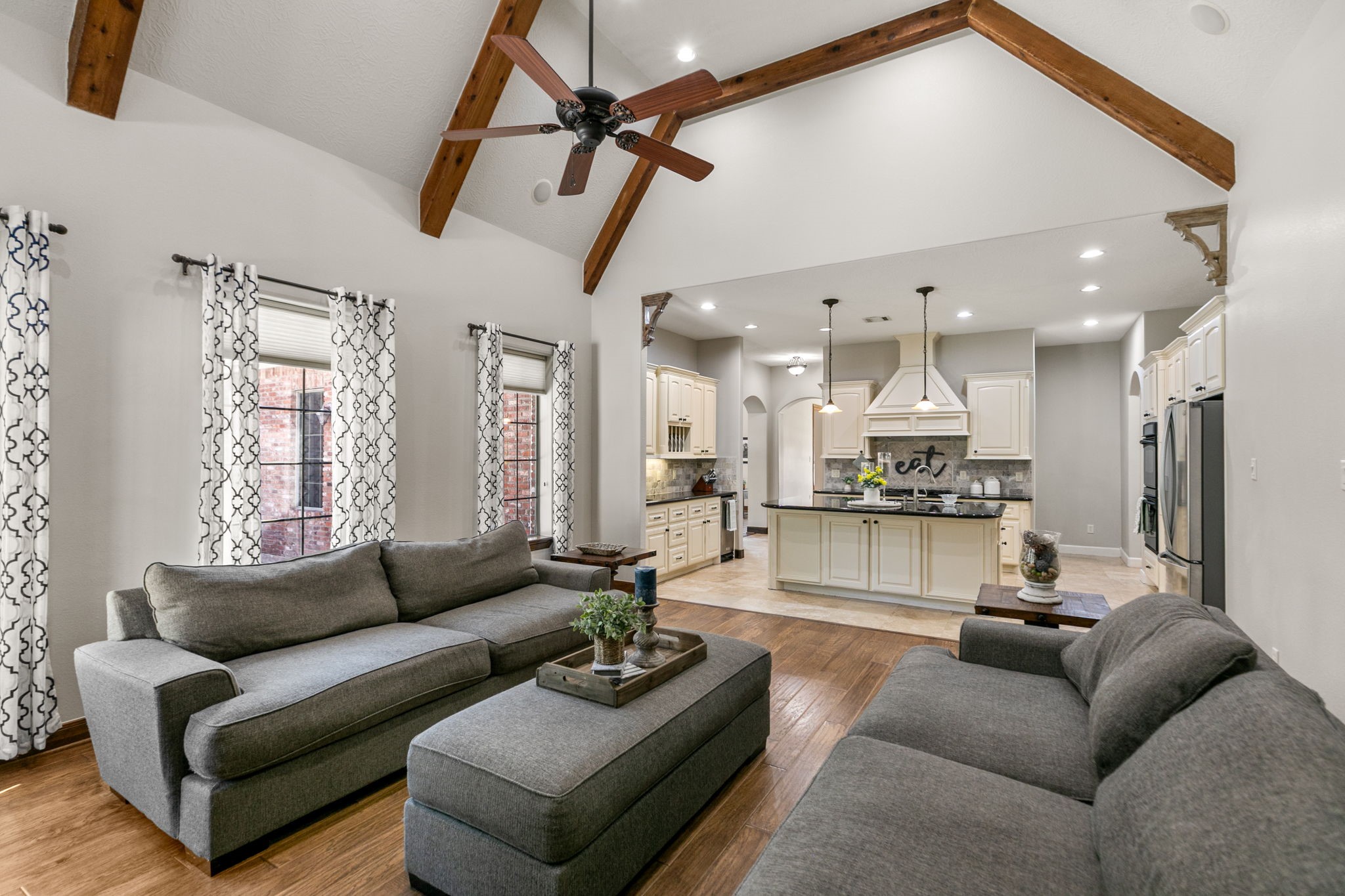 3811 Rayford Road Spring, TX 77386 - Photo 12 of 50 a living room with furniture and kitchen view