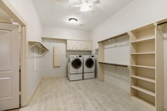 a utility room with washer and dryer