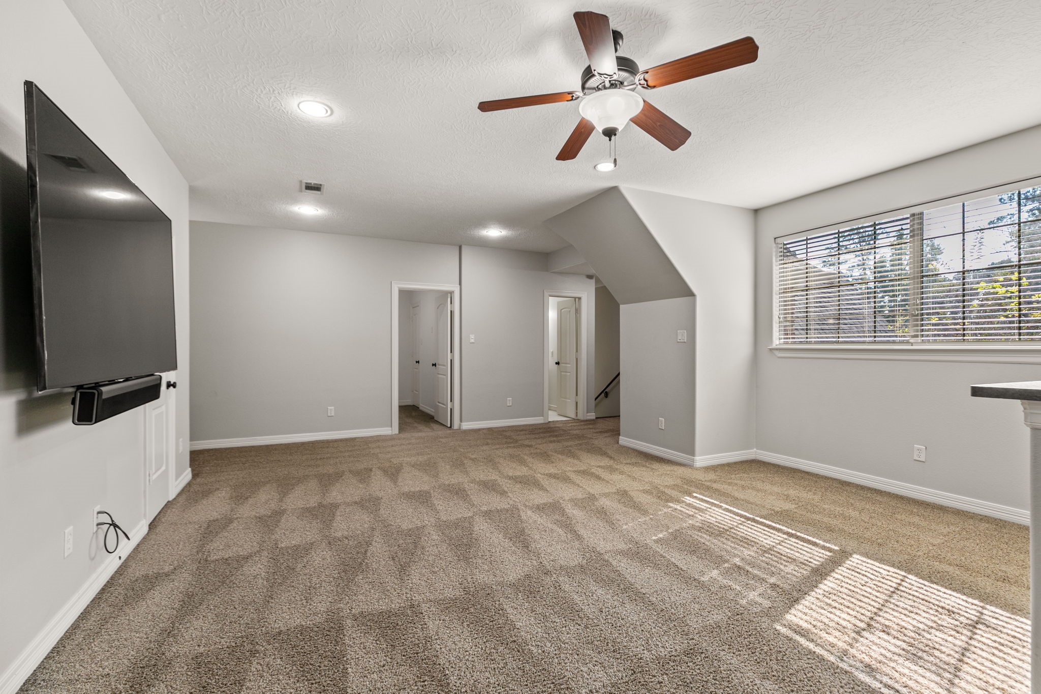 3811 Rayford Road Spring, TX 77386 - Photo 30 of 50 a view of an empty room with a window