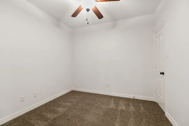 an empty room with cabinet