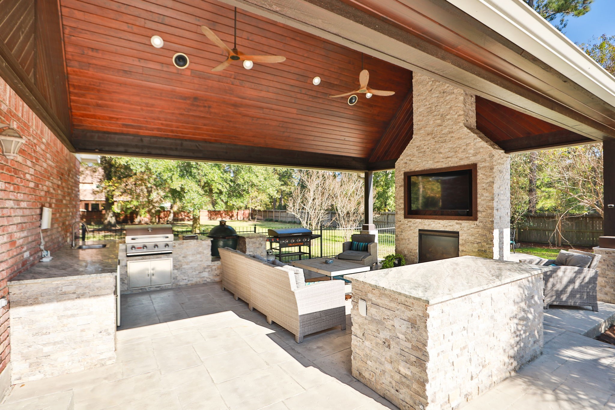 3811 Rayford Road Spring, TX 77386 - Photo 40 of 50 a view of a patio with a table and chairs