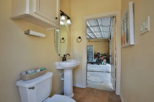 a huge green field with lots of trees