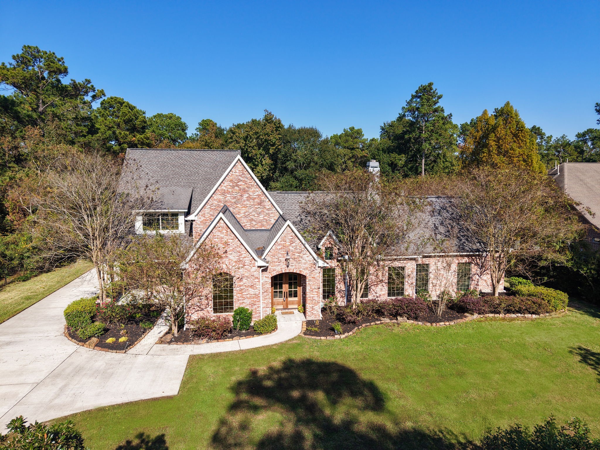 3811 Rayford Road Spring, TX 77386 - Photo 48 of 50 a view of house with yard and green space