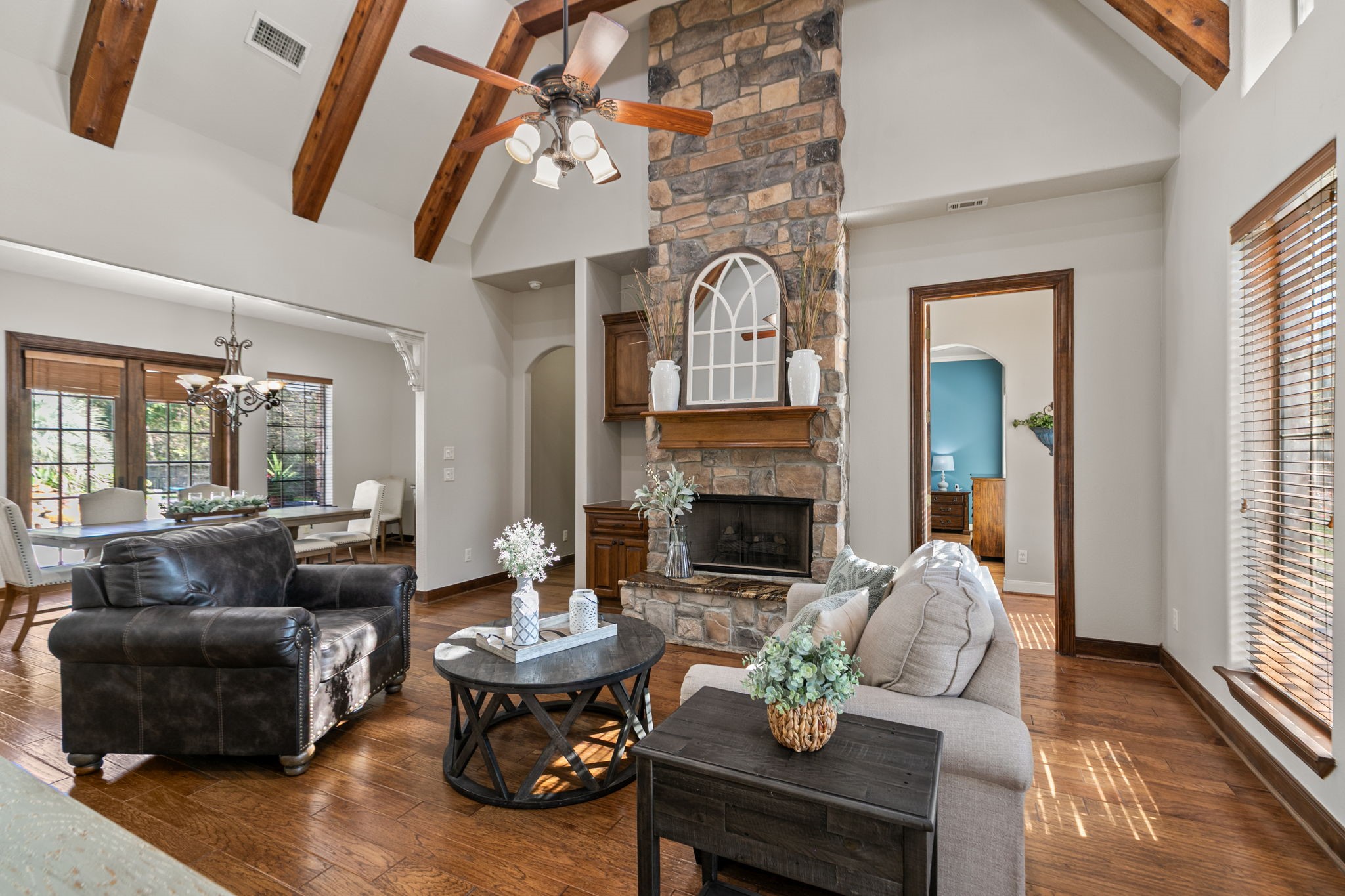 3811 Rayford Road Spring, TX 77386 - Photo 8 of 50 a living room with furniture and a fireplace