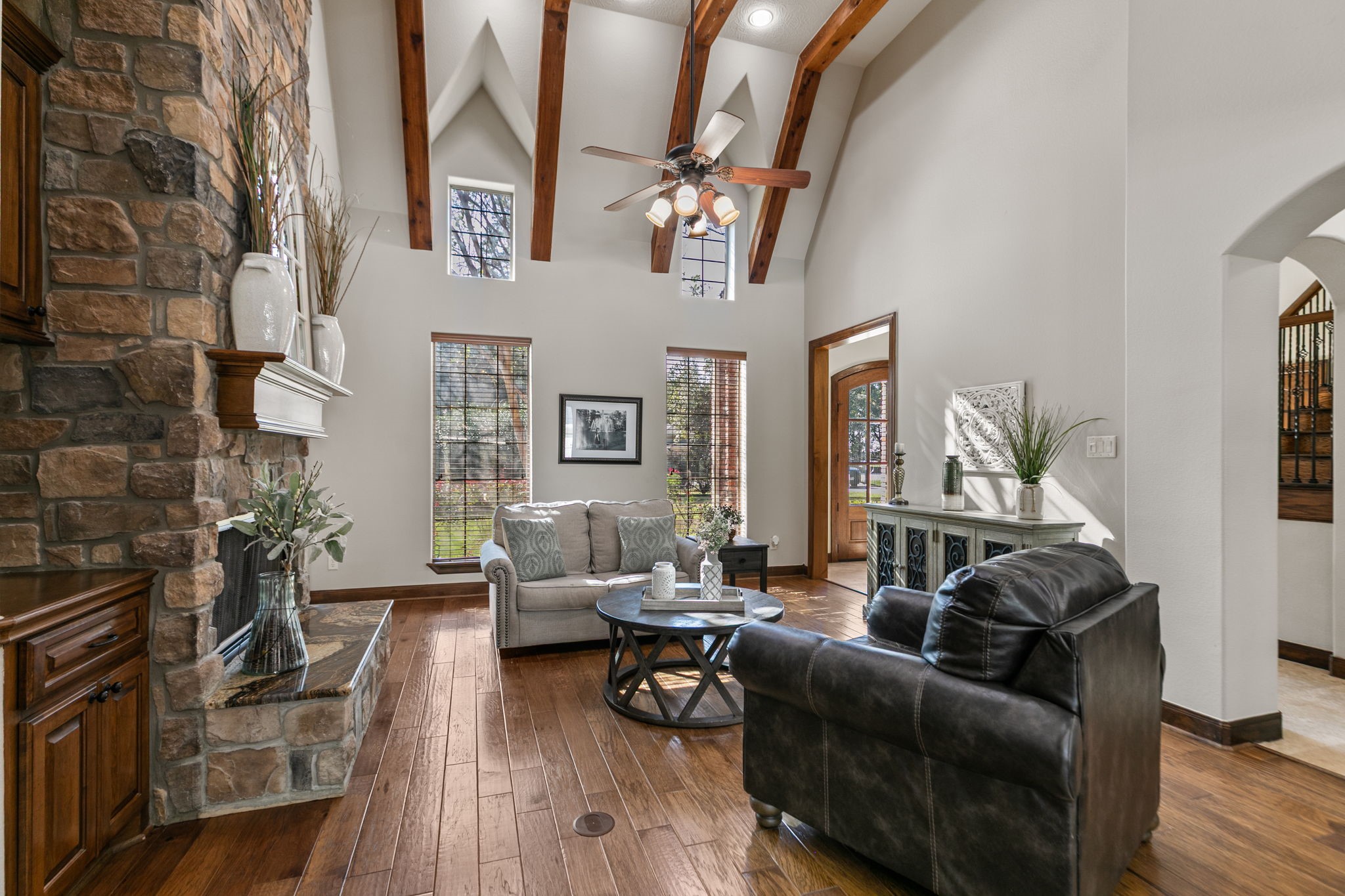 3811 Rayford Road Spring, TX 77386 - Photo 9 of 50 a living room with furniture and wooden floor