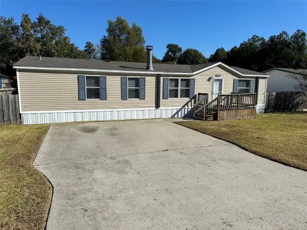 a view of a house with many outdoor space