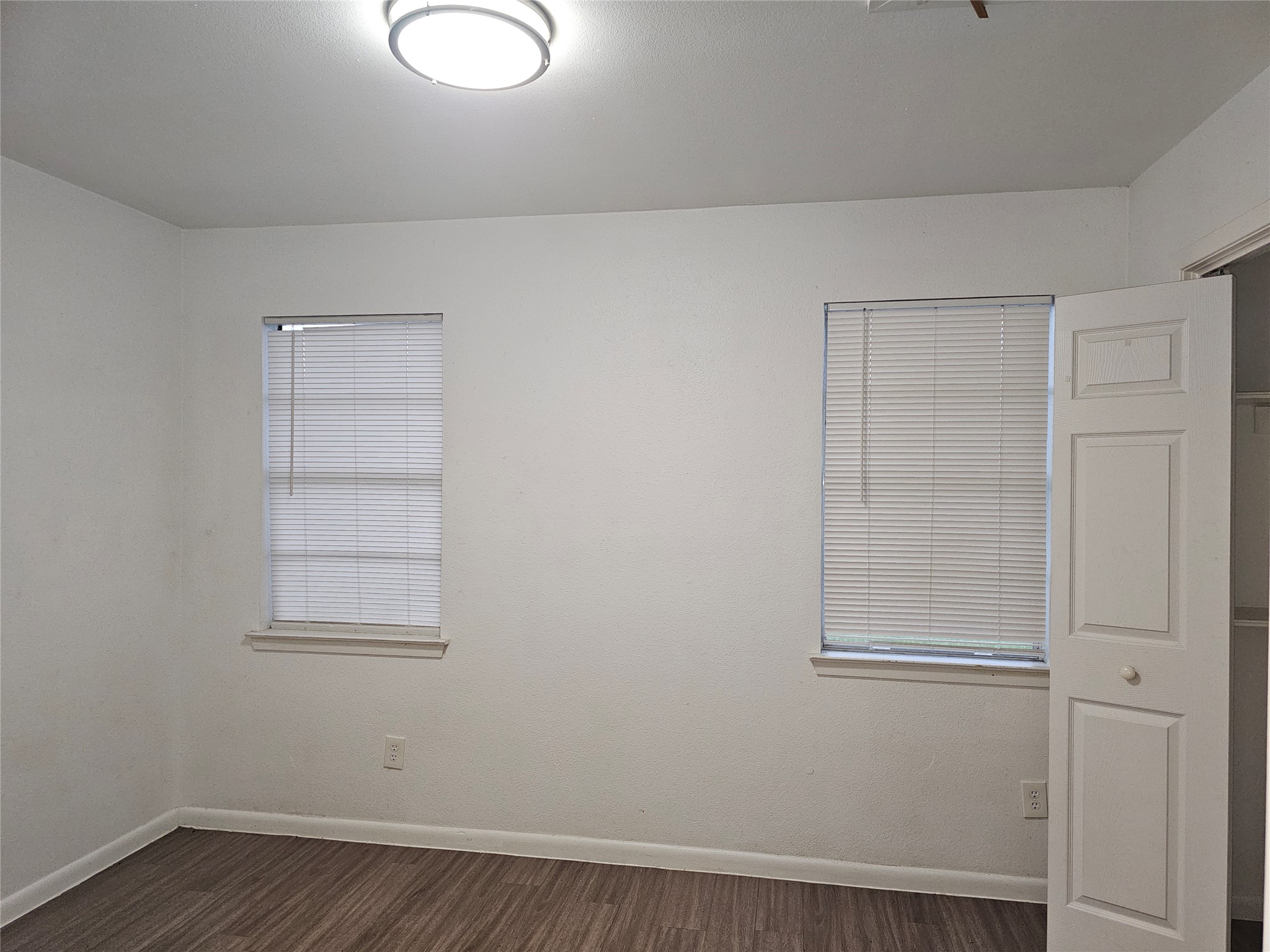 7300 Bennett Avenue, Unit B Austin, TX 78752 - Photo 6 of 11 wooden floor in an empty room