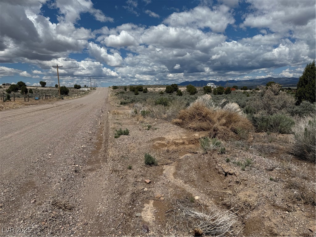 Aspen Pioche, NV 89043 - Photo 6 of 14 View of dirt / gravel road with a view of countryside and a mountain view