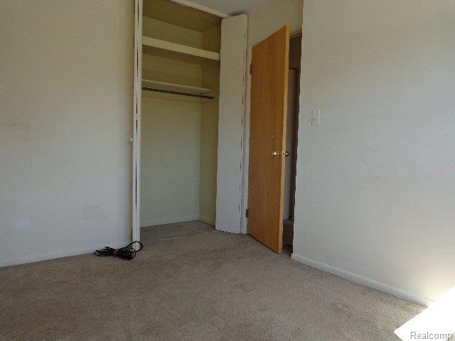 2821 West Thirteen Mile Road, Unit 2 Royal Oak, MI 48073 - Photo 11 of 23 261-843021 Bedroom 1b.JPG