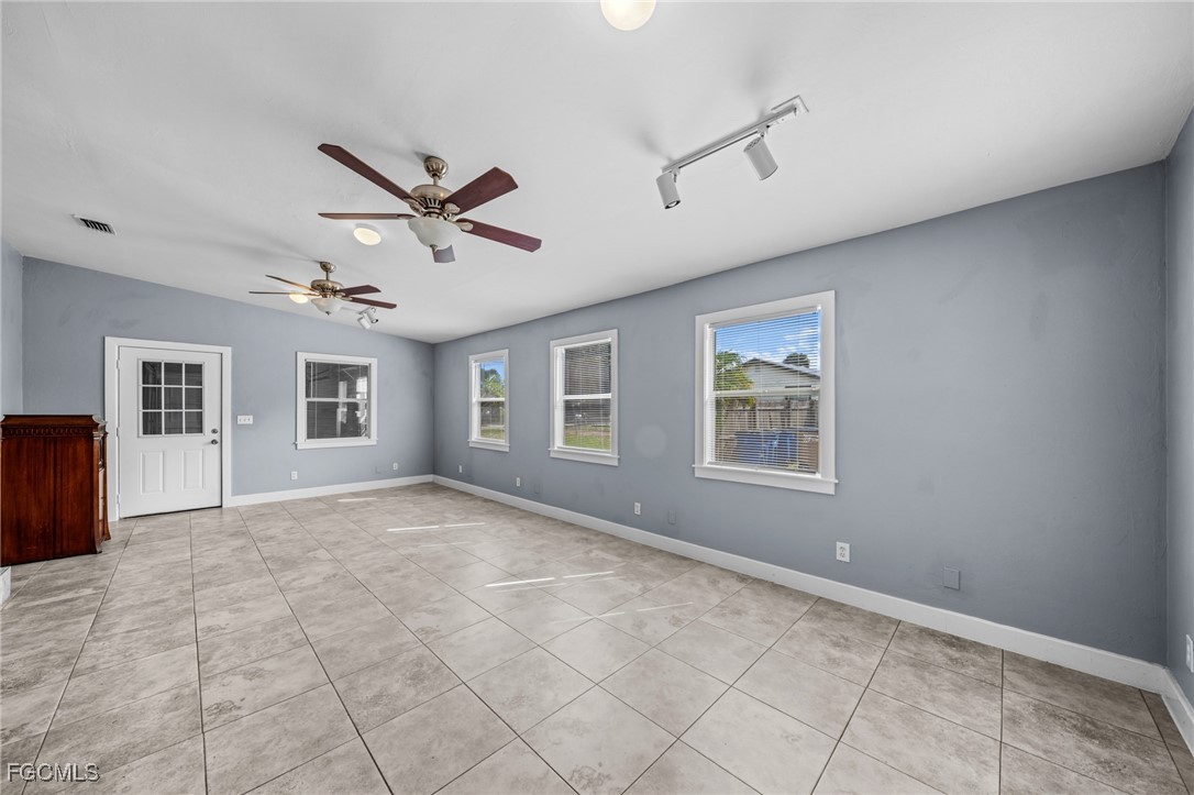 290 Granada Boulevard Fort Myers, FL 33905 - Photo 13 of 37 a view of an empty room with a window