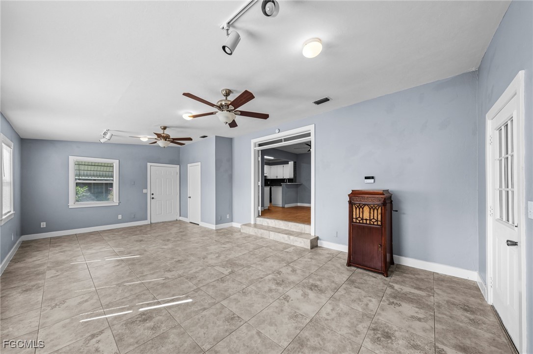 290 Granada Boulevard Fort Myers, FL 33905 - Photo 14 of 37 a view of an empty room with a window