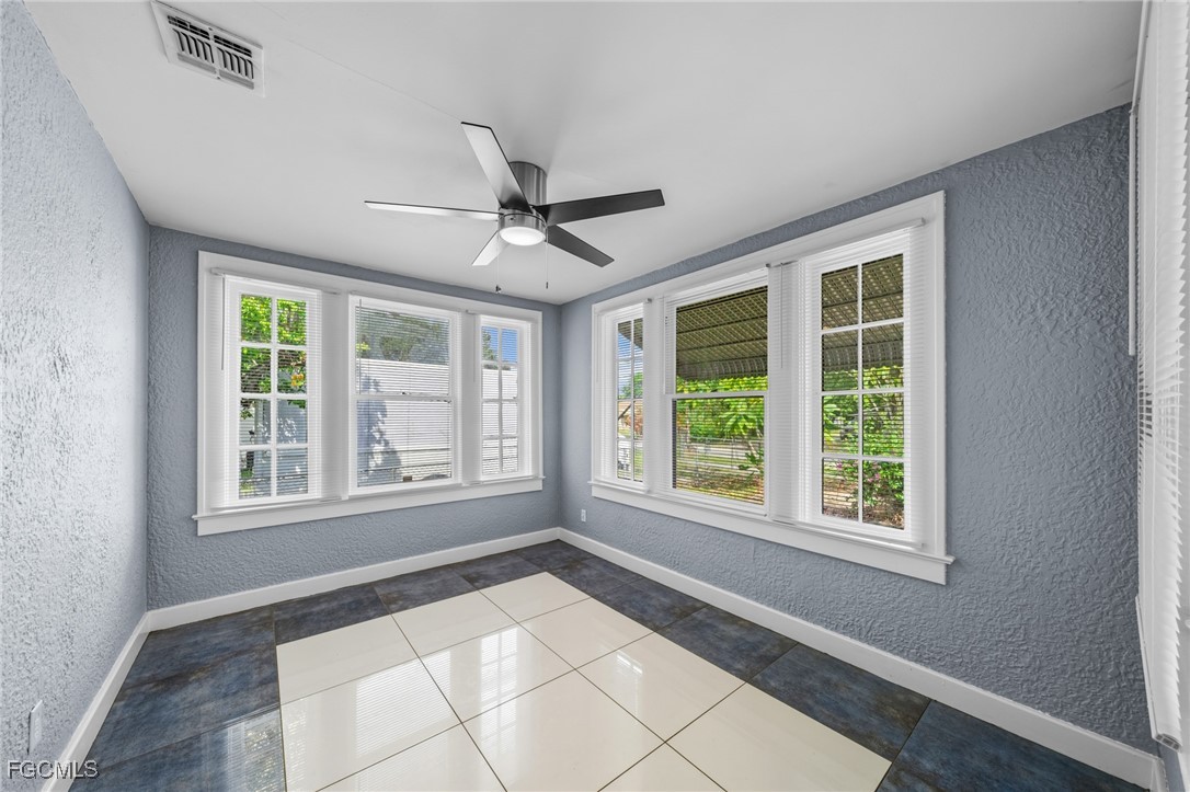 290 Granada Boulevard Fort Myers, FL 33905 - Photo 16 of 37 a view of an empty room with a window