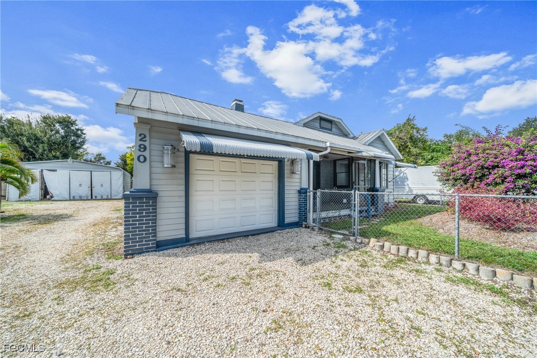 290 Granada Boulevard Fort Myers, FL 33905 - Photo 29 of 37 a view of a house with a yard