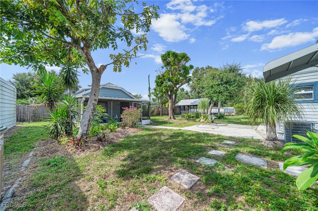 290 Granada Boulevard Fort Myers, FL 33905 - Photo 34 of 37 a view of house with a garden