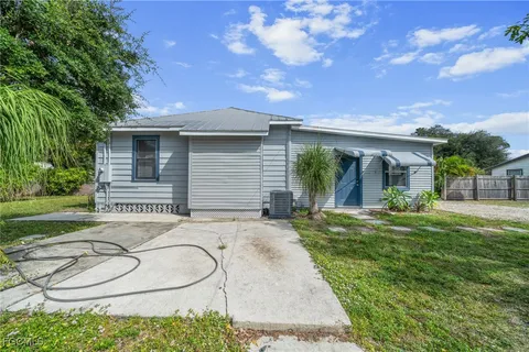 front view of house with a yard