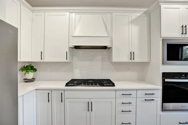 a view of workspace with bookshelf