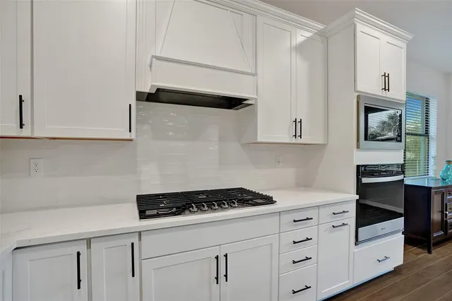 a view of a livingroom with furniture and toys