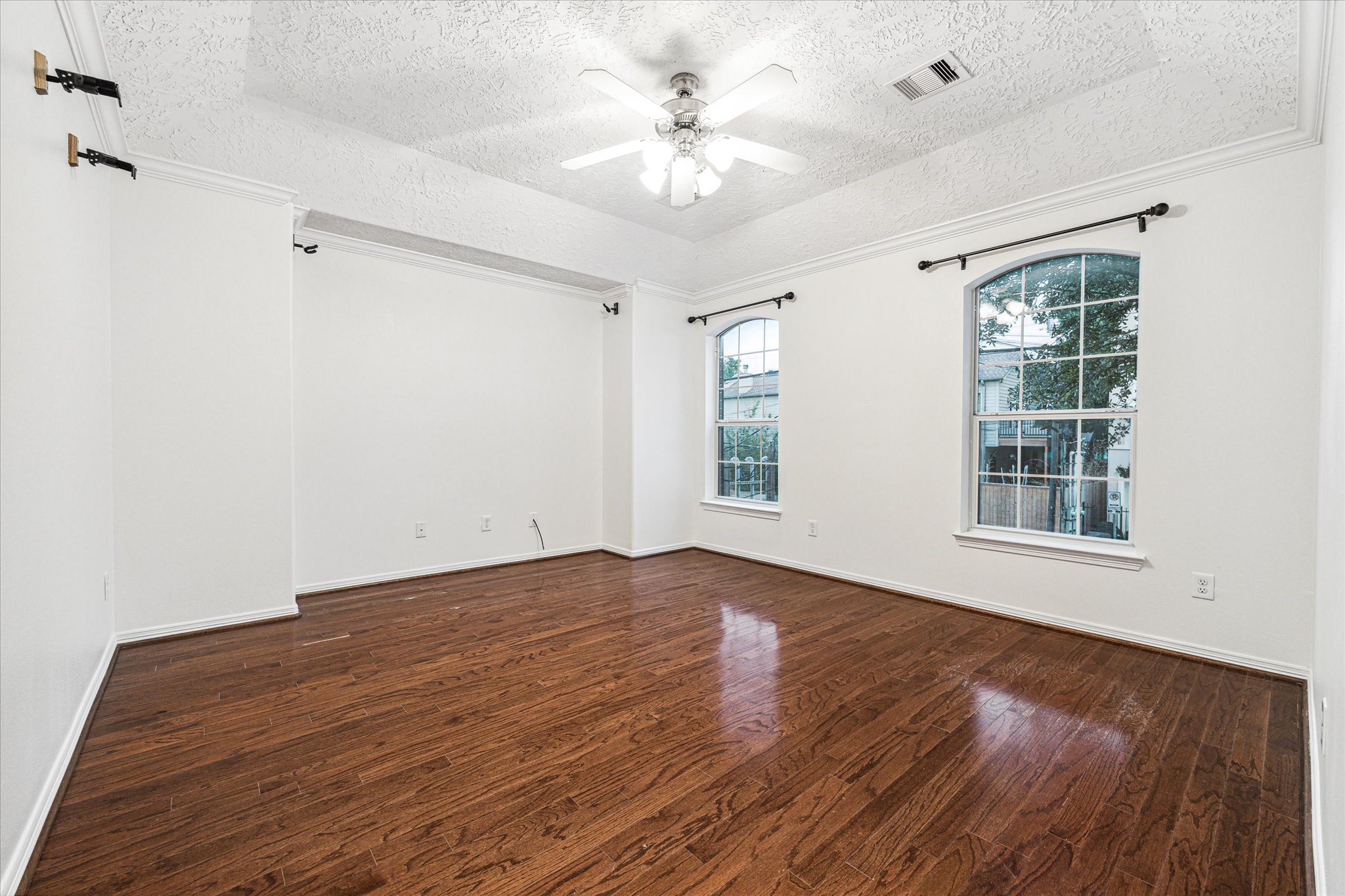 1613 West 15th Street Houston, TX 77008 - Photo 13 of 25 wooden floor in an empty room with a window