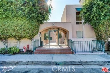 400 Monterey Road, Unit 11 Glendale, CA 91206 - Photo 11 of 14 a front view of a house with garden