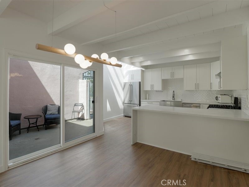 400 Monterey Road, Unit 11 Glendale, CA 91206 - Photo 4 of 14 a view of kitchen with sink and refrigerator