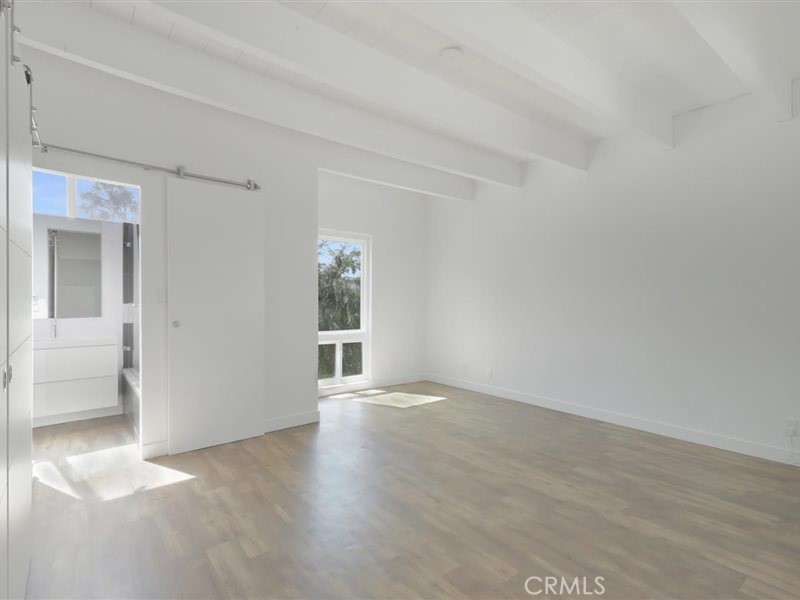 400 Monterey Road, Unit 11 Glendale, CA 91206 - Photo 8 of 14 a view of an empty room with a window