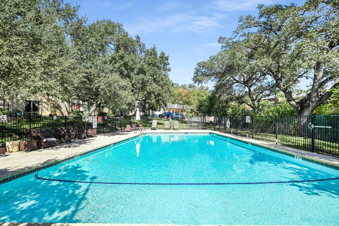 5332 Balcones Drive, Unit I Austin, TX 78731 - Photo 12 of 16 a view of outdoor space and swimming pool